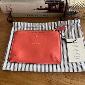 NWT Anya Hindmarch “I LOVE YOU” Leather Pouch – Chic, Playful Luxury